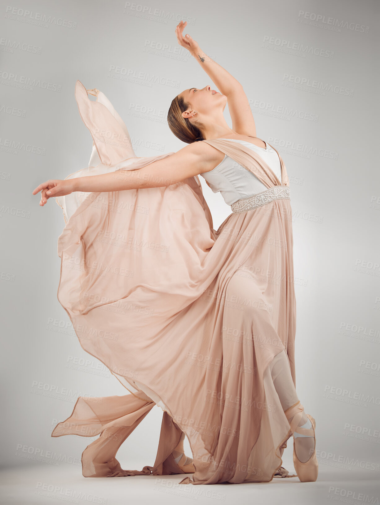 Buy stock photo Ballet, woman and ballerina in studio for performance, training and dance routine on gray background. Contemporary, dancing and person with costume for elegant art, movement and practice technique