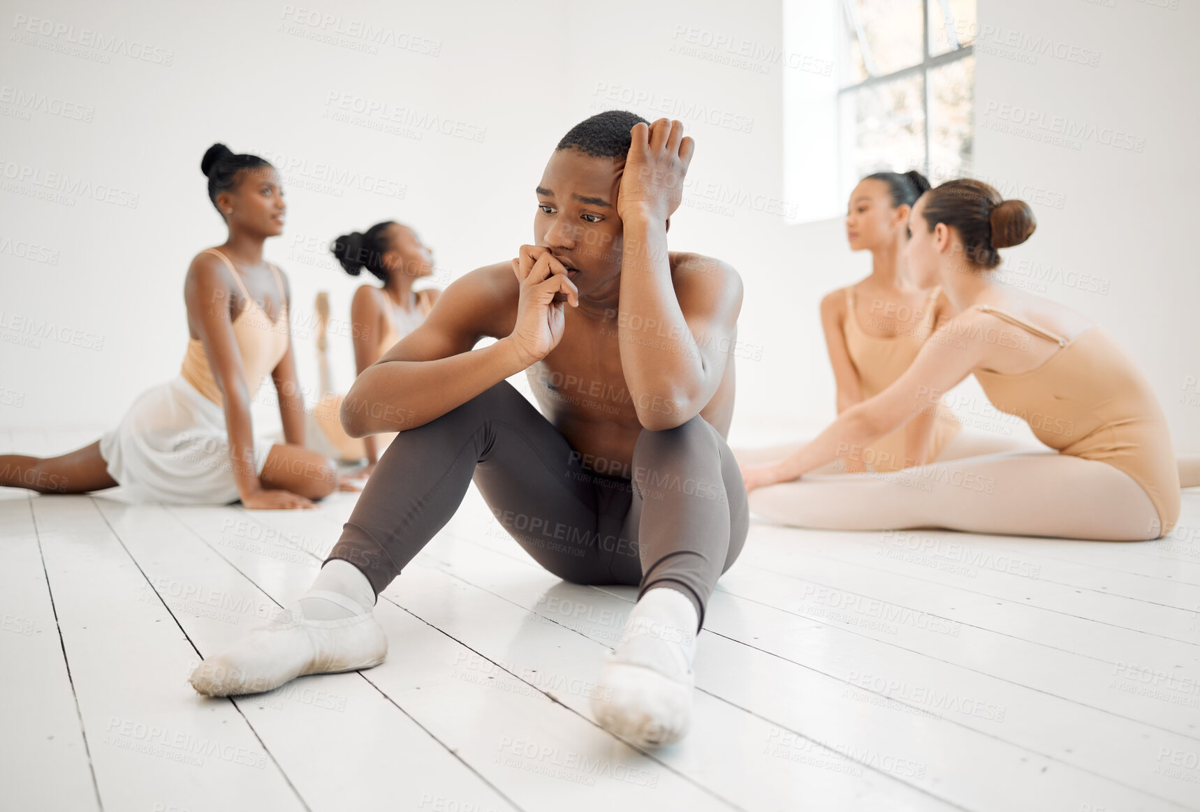 Buy stock photo Studio shot of a young ballet dancer having a stressful day in a dance studio