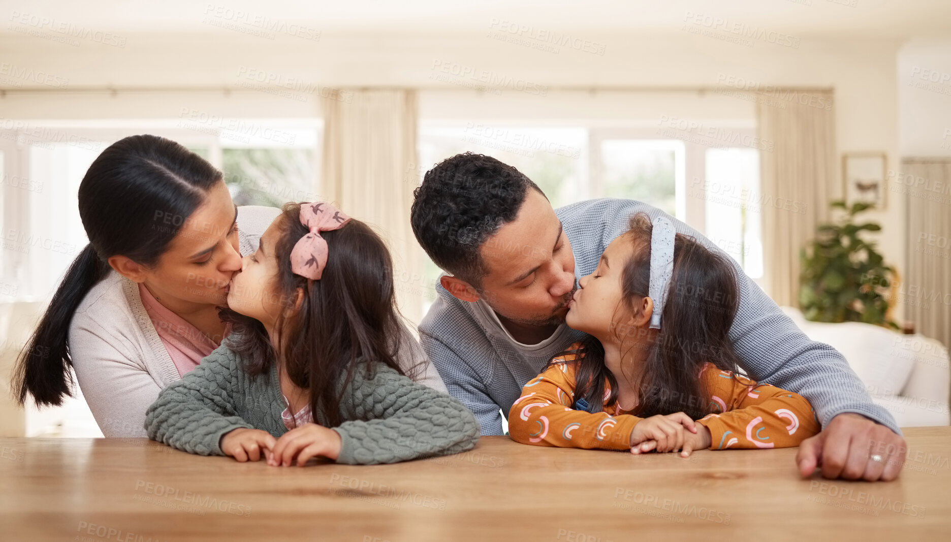 Buy stock photo Bonding, parents and children in kitchen, kiss and love of family, affection and dad with care for daughter. Siblings, mother and father with kids, woman and man in house, break and together in home