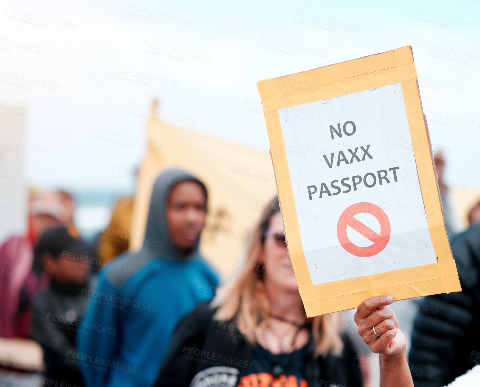 Buy stock photo Crowd, protest and poster for vaccine, passport or opinion on sign, medical or human rights in city. People, paper and board to stop pharma, choice and decision for covid drugs with freedom in street