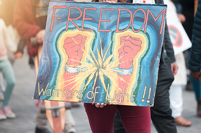 Buy stock photo Person, hands and protest with billboard for freedom, human rights or equality together in city. Activist, community or group in rally with poster, sign or board with art or graphic for riot or march