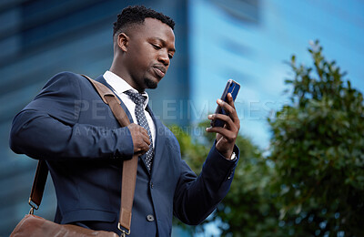 Buy stock photo Online, business and black man in city with phone reading news, info or crypto stocks update. Businessman, research and investor travel with smartphone for virtual contact to client or sales app
