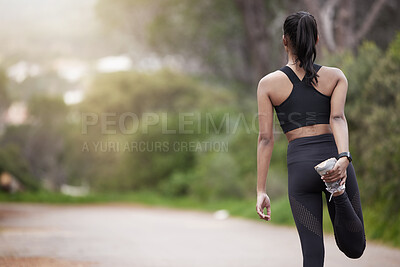 Buy stock photo Nature, woman and warm up from back, workout motivation and fitness while stretching legs. Dedication, commitment and girl runner standing on road with leg stretch for outdoor run and exercise goals.