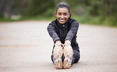 Nature, portrait of woman stretching legs and warm up, workout motivation and fitness mindset with hands on feet. Focus, commitment and girl on floor, leg stretch for outdoor run and exercise goals.
