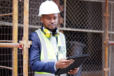 Buy stock photo Shot of a young man working on a construction site outside