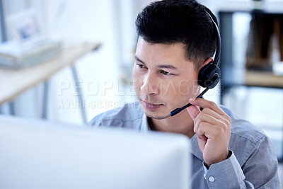 Buy stock photo Computer, call center and business man listening for telemarketing, customer service and support. Contact us, crm and male sales agent, professional or consultant with microphone for online help desk