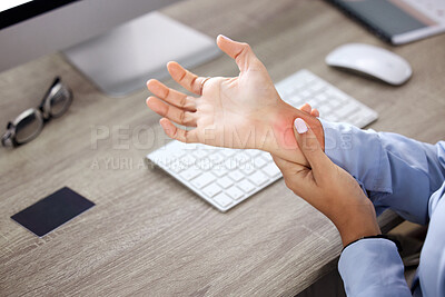Buy stock photo Hands, wrist pain and injury at desk in office with red glow, overlay and massage with burnout. Person, arthritis or carpal tunnel syndrome with emergency, strain and fatigue by computer in workplace