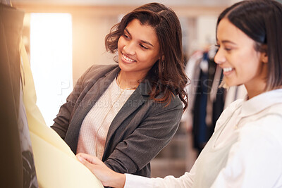 Buy stock photo Fashion, retail and customer friends shopping in a mall together while searching for sales in a clothing store. Consumerism, smile, or happy with a woman and friend in a boutique shop to buy clothes