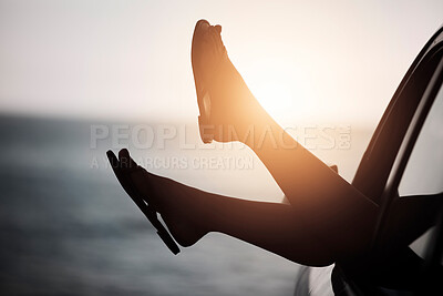 Buy stock photo Sunset, beach and feet in window of car on road trip for tropical holiday, vacation or adventure. Travel, freedom and person with shoes in vehicle to ocean or sea in summer to relax with peace