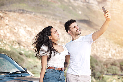 Buy stock photo Happy couple, nature and road trip with selfie for photography, picture or outdoor memory together. Man and woman with smile for adventure, journey or holiday moment in travel, vacation or weekend