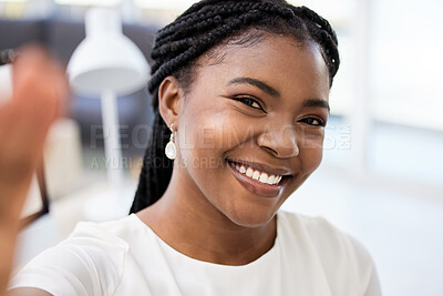 Buy stock photo Shot of a young businesswoman taking a selfie at work