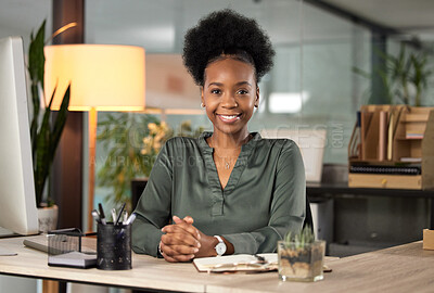 Buy stock photo Cropped portrait of an attractive young businesswoman working at her desk in the office