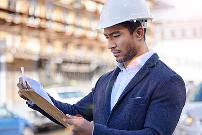 Buy stock photo Architect, man and clipboard and inspection in construction site with checklist, industry and confident. Male person, project management and hardhat in Dubai for building, engineering and development