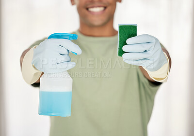 Buy stock photo Shot of a man holding a sponge and a bottle of detergent