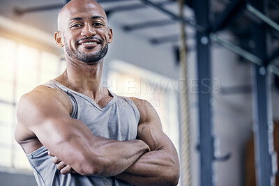 Buy stock photo Man, portrait and arms crossed in gym for exercise with smile, training or workout for fitness. Male person, confident or personal trainer in sports club or strong, cardio or wellness in Chicago