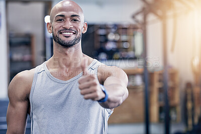 Buy stock photo Thank you, portrait of man and with thumbs up at the gym with a lens flare. Success or motivation, agreement or health wellness and male athlete happy for support workout or fitness training