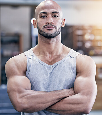 Buy stock photo Man, portrait and arms crossed in gym with serious for training client, strong body and health career. Pride, muscle and face of personal trainer in wellness club for workout, sport and bodybuilder