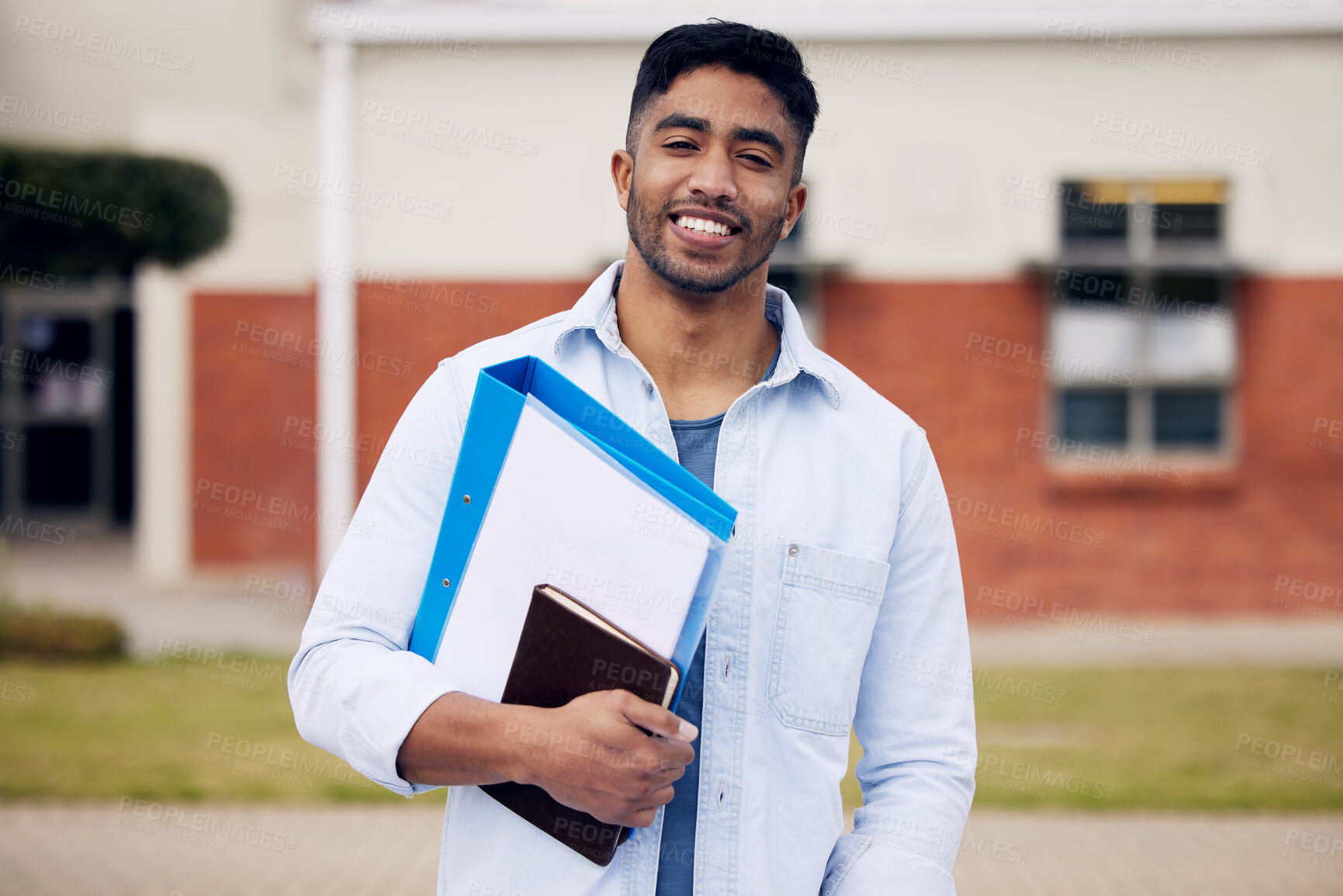 Buy stock photo Happy, college and portrait of a man with books on campus for education, learning and studying. Smile, notebook and a student standing at university for scholarship, knowledge and school exam