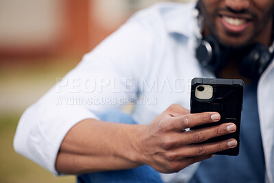 Buy stock photo Man, student and hands typing with phone for social media, communication or reading news at college. Closeup of male person with smile on mobile smartphone for online chatting, outdoor texting or app