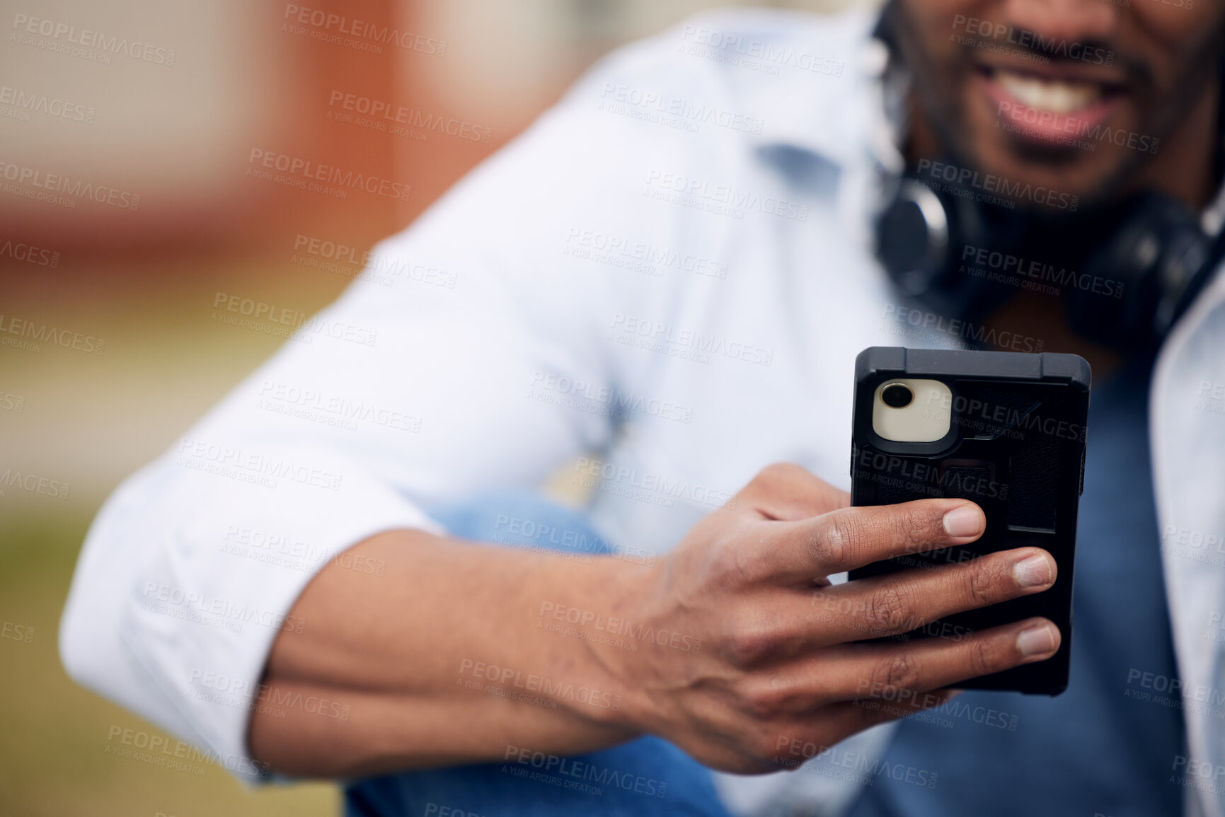 Buy stock photo Man, student and hands typing with phone for social media, communication or reading news at college. Closeup of male person with smile on mobile smartphone for online chatting, outdoor texting or app