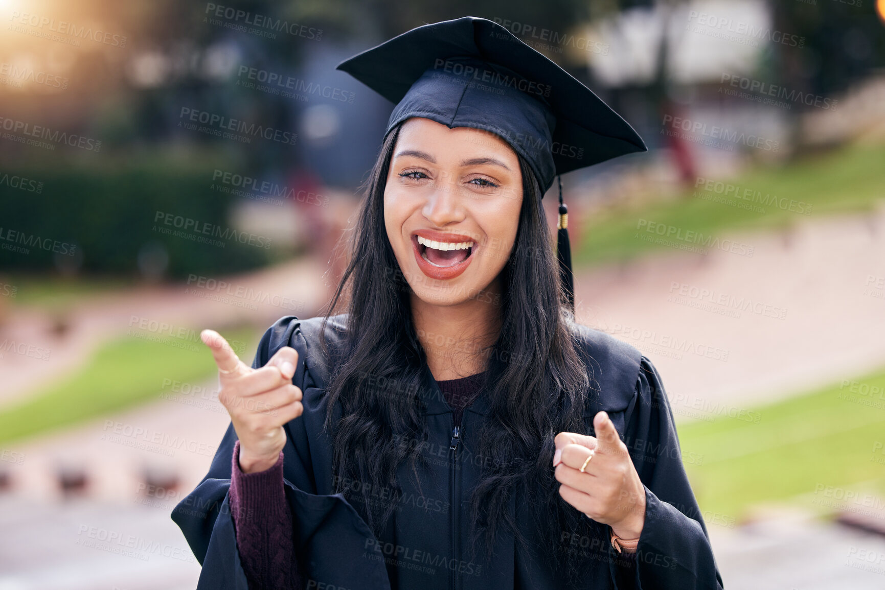 Buy stock photo Cropped portrait of an attractive young female student celebrating on graduation day