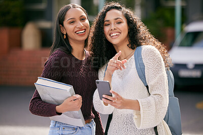 Buy stock photo Phone, college and female students networking on social media, mobile app or the internet. Happy, smile and women friends reading information on online website standing outdoors on university campus.