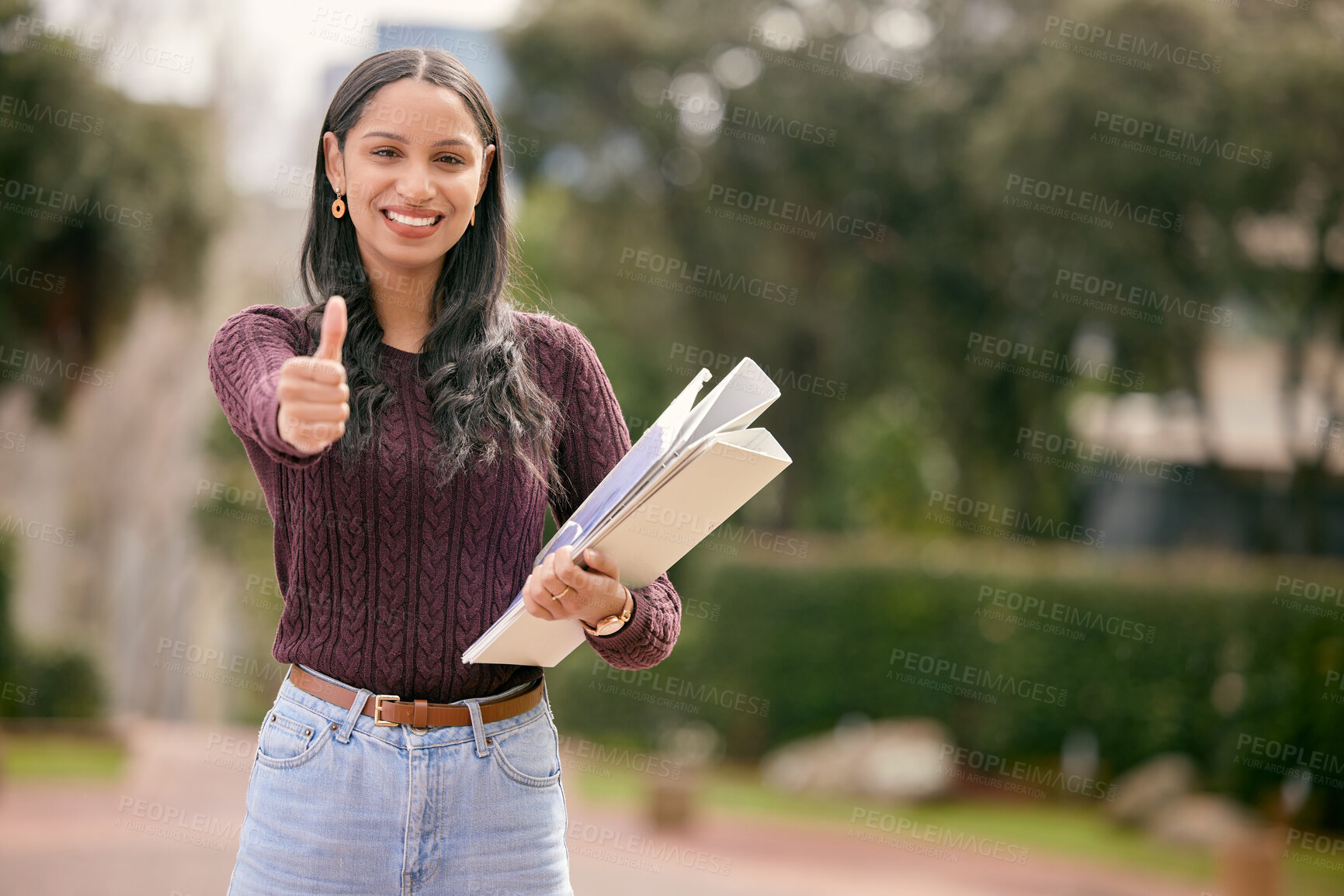 Buy stock photo Girl, student and portrait for thumbs up in outdoor, approval and promotion for university study. Female person, books and emoji for review on college education, support and agreement for learning