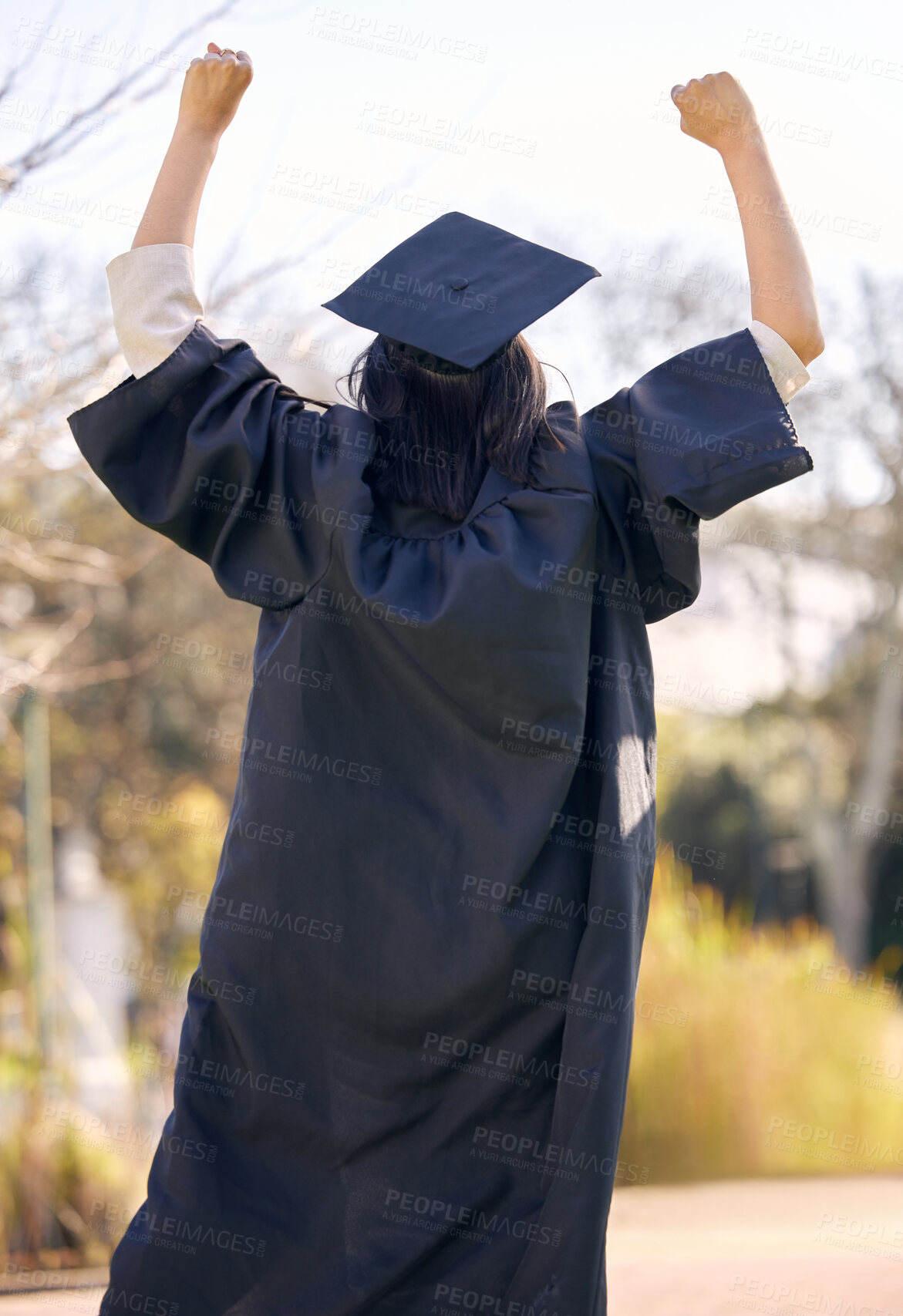 Buy stock photo Nature, celebration and back of girl with graduation for knowledge, growth and success in education. Outdoor, freedom and student with pride at academy for scholarship, academic goals and achievement