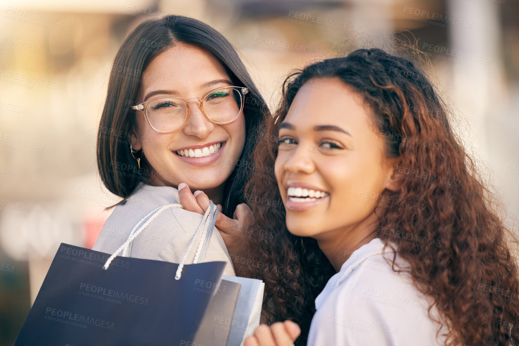 Buy stock photo Portrait, shopping and women in a city, retail and happiness with discount, boutique items and buyers. Face, female clients or customers with fashion, sales or consumer choice with a deal and outdoor