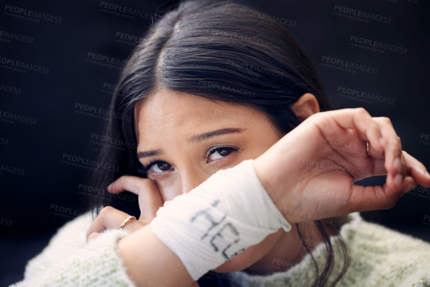 Buy stock photo Depression, woman and crying for help, suicide and mental health support with self harm idea in portrait. Girl, bandage and wrist injury or accident for pain, trauma and anxiety with frustrated tears