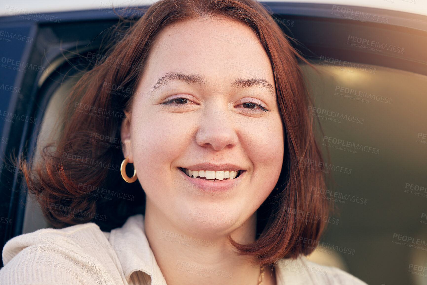 Buy stock photo Portrait of a young woman traveling in a car