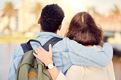 Buy stock photo Shot of a young couple exploring a city together