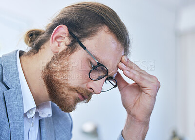 Buy stock photo Closeup shot of a businessman looking stressed at work