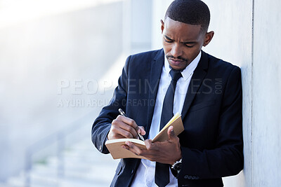 Buy stock photo African businessman, city and notebook for writing, planning and schedule for urban law firm. Lawyer, book and idea for goal, case research and morning routine for report or agenda with solution