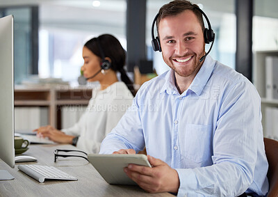 Buy stock photo Call center, portrait and happy man on tablet in office for tech support, help desk and customer service. Face, telemarketing consultant and professional agent coworking, business and contact us