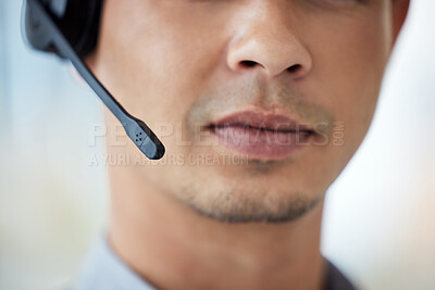 Buy stock photo Closeup shot of a call centre agent working in an office