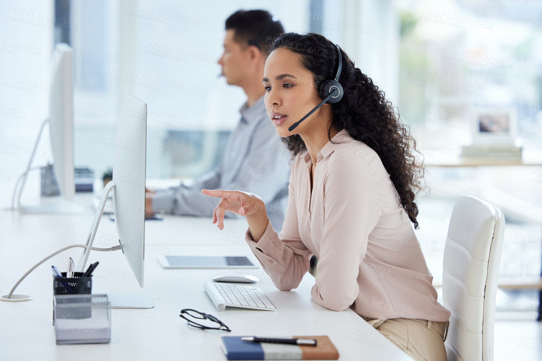 Buy stock photo Call center, computer and consultant woman in telemarketing office for online assistance, help or research. Contact us, desk and microphone with agent at work for customer support or problem solving