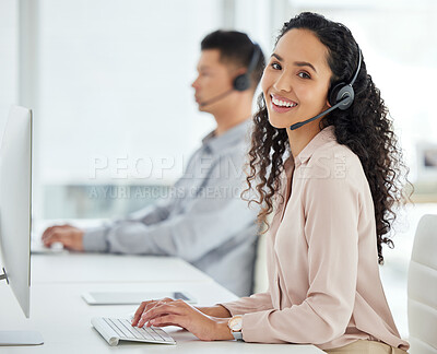 Buy stock photo Call center, smile and portrait of a woman at a computer for online support, advice or communication. Happy, contact us and a customer care employee typing on a pc for telemarketing consultation