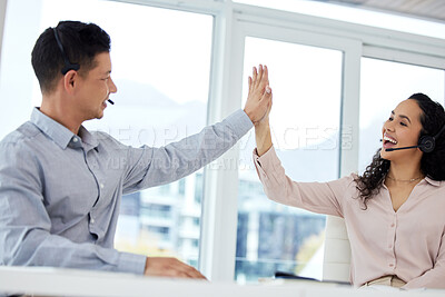 Buy stock photo Call centre, man and woman with high five, celebration and happiness for goal of target and milestones. Office, colleagues and collaboration in agency, headset and telemarketing for sales or service