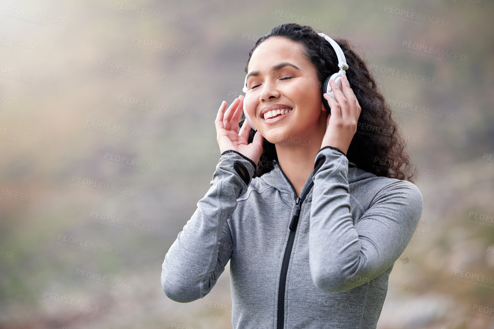 Buy stock photo Headphones, woman or calm runner in nature streaming music to start training, workout or exercise. Happy, outdoor or healthy sports athlete on break listening to radio or fitness podcast to relax