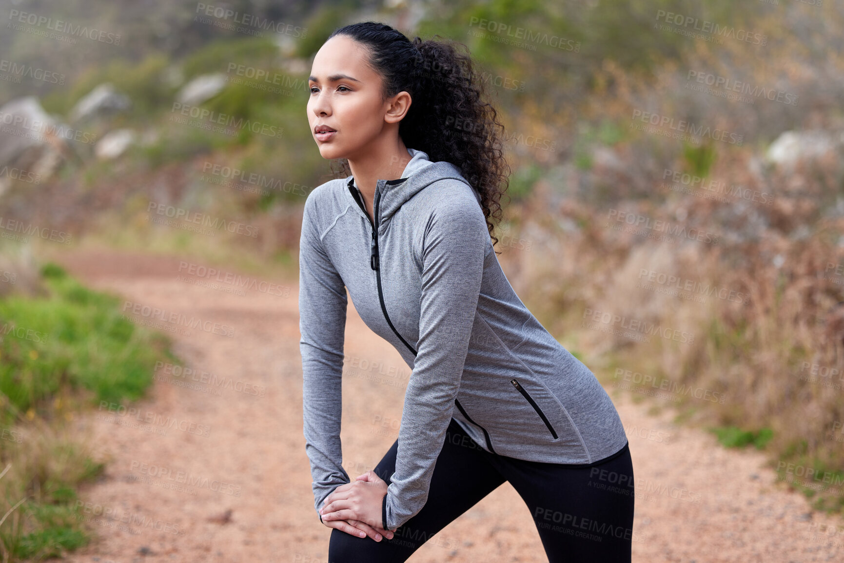 Buy stock photo Runner, stretching or woman on trail for workout, training or exercise with mobility or healthy body. Mountain, sports person and girl in nature running, hiking and wellness for fitness and break