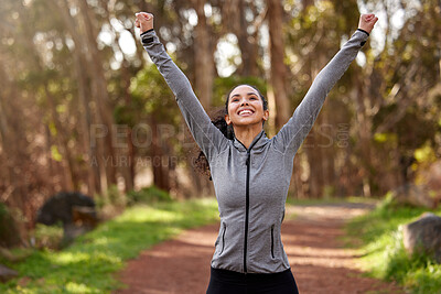 Buy stock photo Outdoor, runner and woman with celebration, fitness and cheering with achievement, nature and progress. Person, girl and athlete in forest, training and energy with goals, target and success with joy