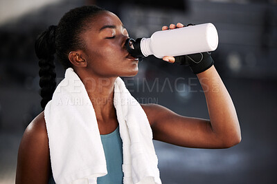 Buy stock photo Relax, fitness or black woman drinking water in gym after training, workout or exercise to hydrate her body. Fatigue, wellness or tired girl with bottle for healthy liquid hydration on resting break