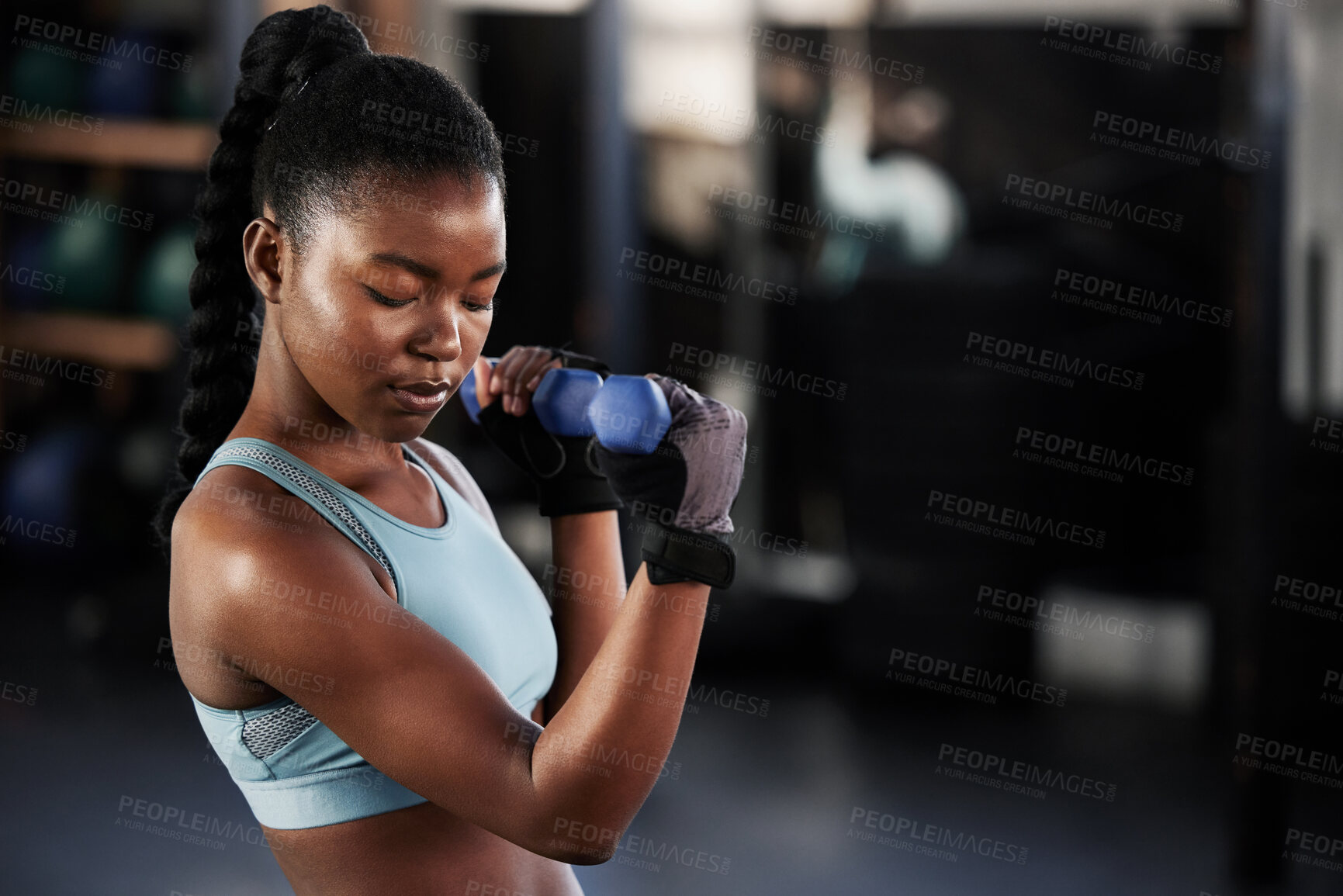 Buy stock photo Fitness, dumbbell or strong black woman training, exercise or workout for powerful arms or muscles. Wellness, healthy or African girl lifting dumbbells, weights or exercising biceps in gym studio 