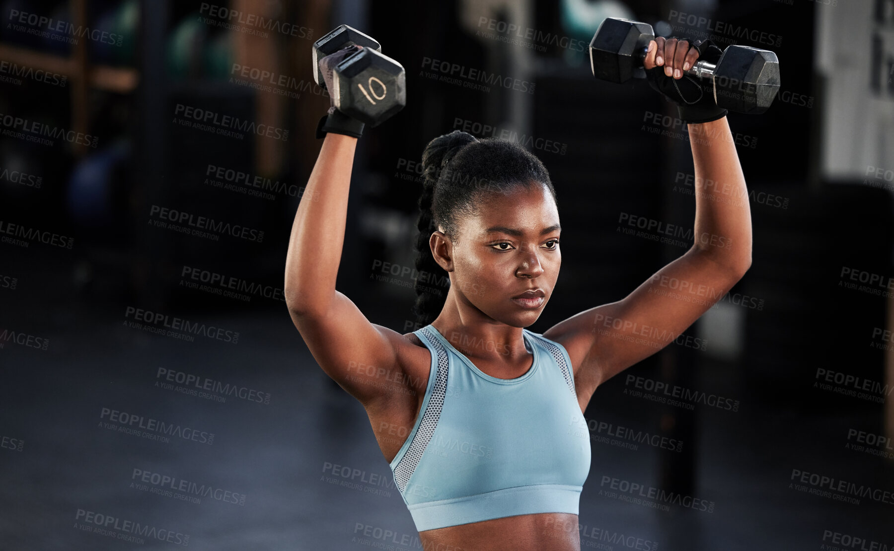 Buy stock photo Fitness, dumbbells or strong girl training, exercise or workout for powerful arms or muscles development. Wellness, health or black woman lifting weights or exercising shoulders in gym club studio