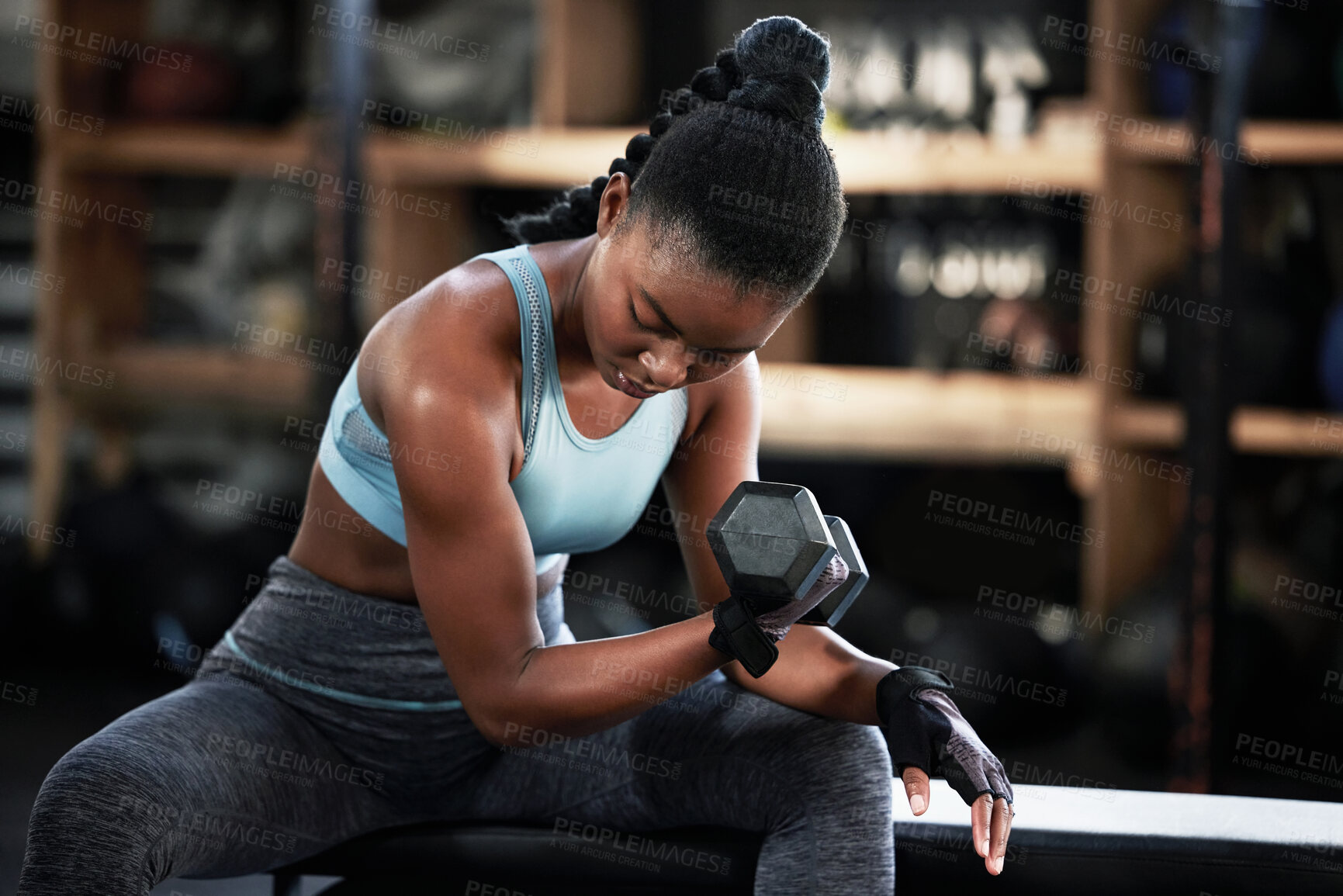 Buy stock photo Gym, dumbbell or strong girl training, exercise or workout for powerful arms or muscles for body fitness. Concentration curls, strength or African woman athlete lifting weights or exercising biceps 