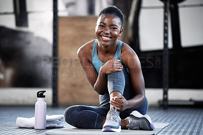 Buy stock photo Relax, portrait or happy black woman at gym for a workout, exercise or training for healthy body or fitness. Face of sports girl or African athlete smiling or relaxing on break with positive mindset 