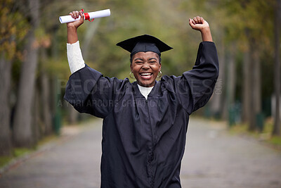 Buy stock photo Portrait of a young woman cheering on graduation day
