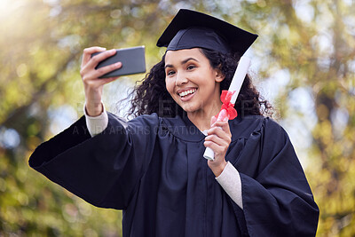 Buy stock photo Shot of a young woman taking a selfie on graduation day