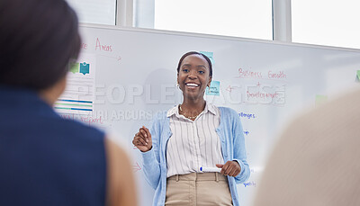 Buy stock photo Shot of a young businesswoman giving a presentation